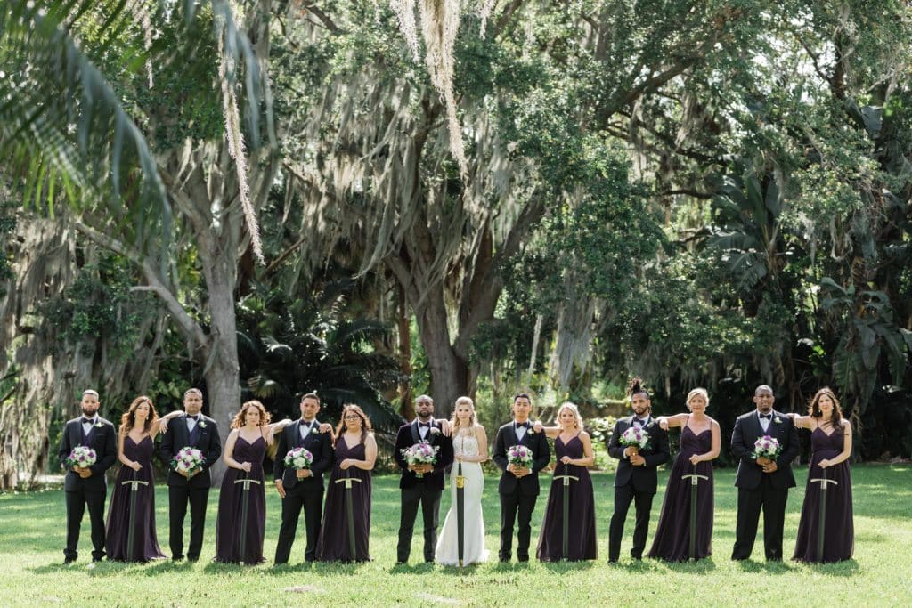 wedding party dressed in black photographed outdoors by Ashley Jane Photography