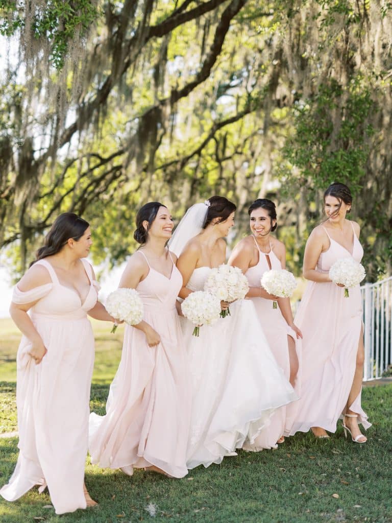 pretty in pink bridesmaids with pompom bouquets by Dream Design Florist