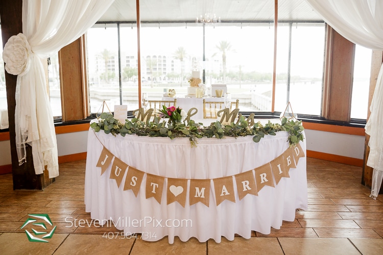 wedding reception sweetheart table draped with Just Married at 520 on the Water