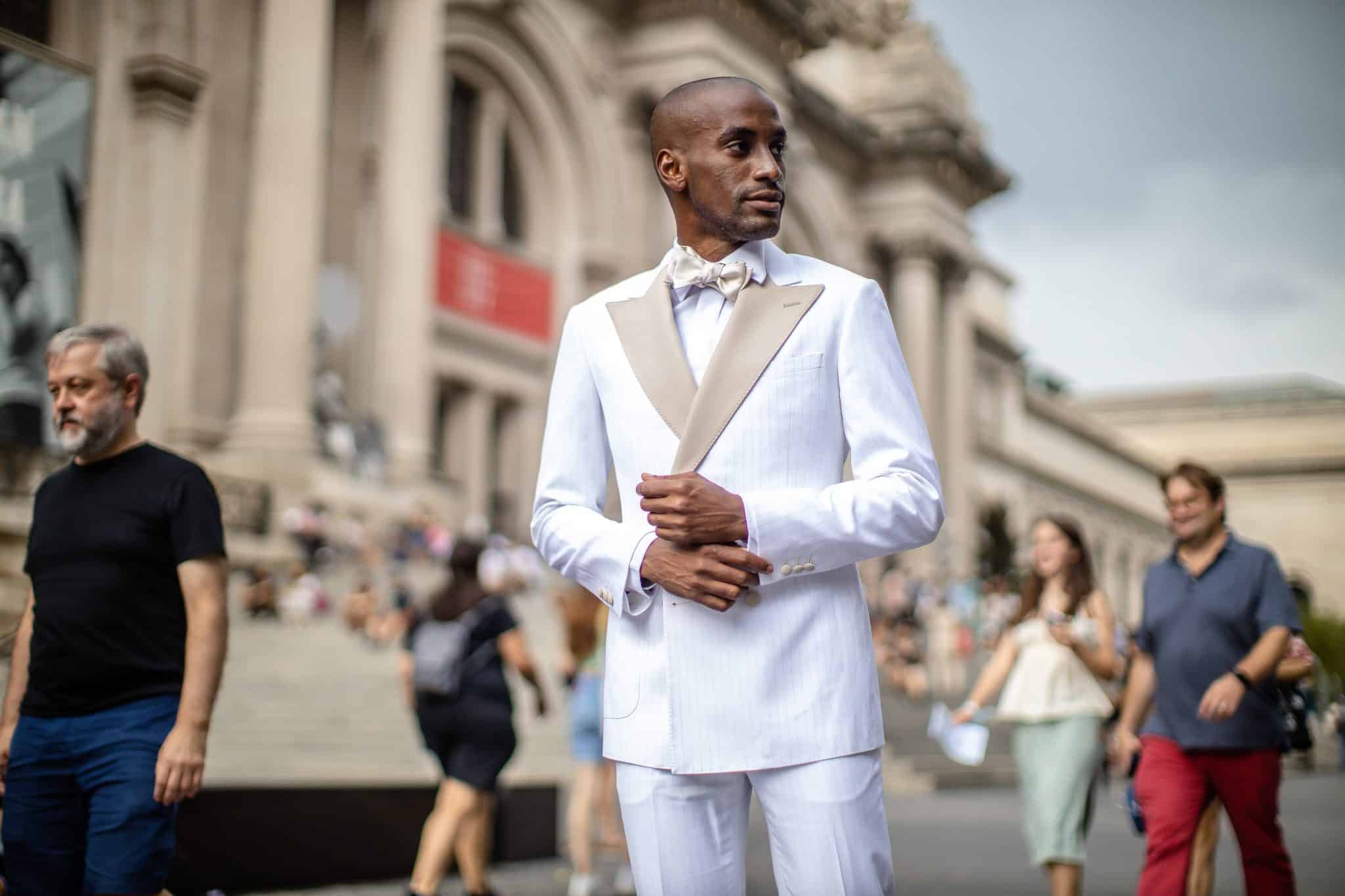 Modern man models Leonardo 5th Avenue white suit and tuxedo