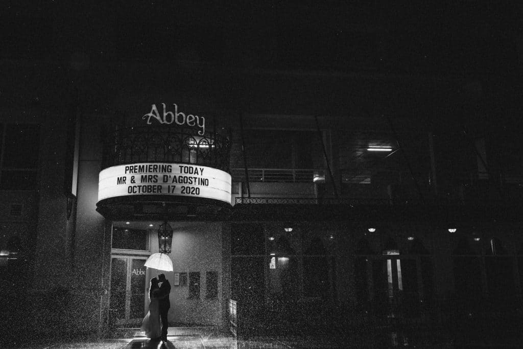 black and white photo of wedding movie marquee photographed by Ashley Jane Photography