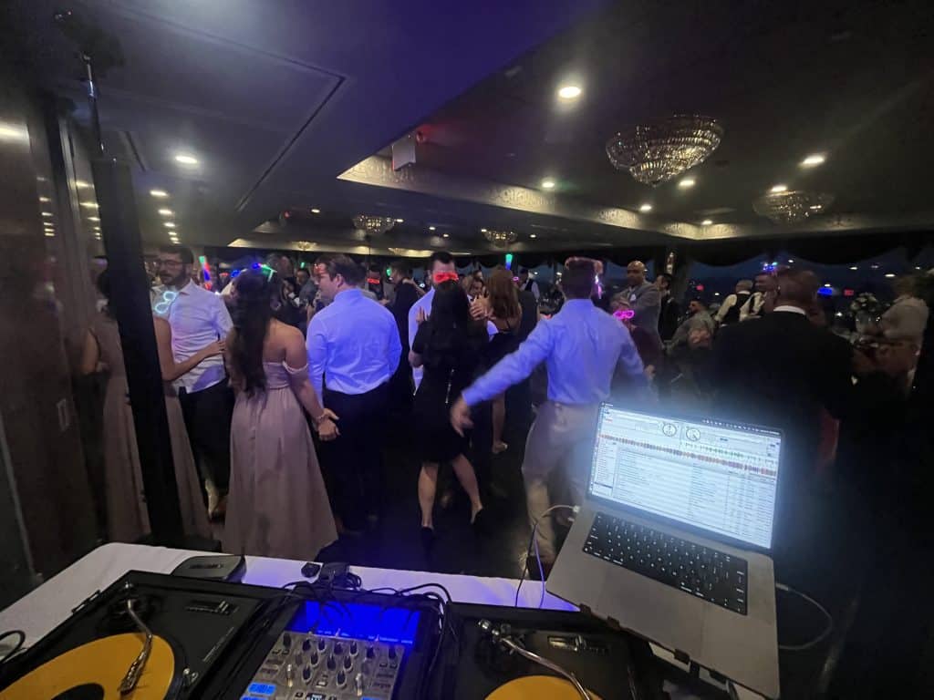 a full dance floor at a wedding with music provided by All Good Entertainment
