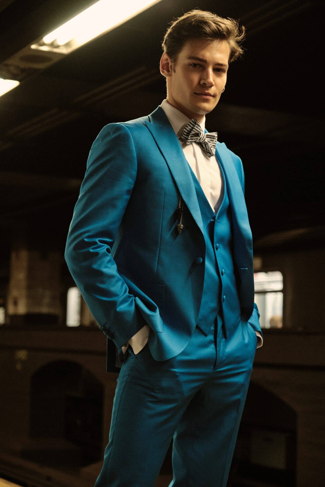Gentleman models Central Florida's Leonardo 5th Avenue cobalt blue modern suit with vest and bowtie