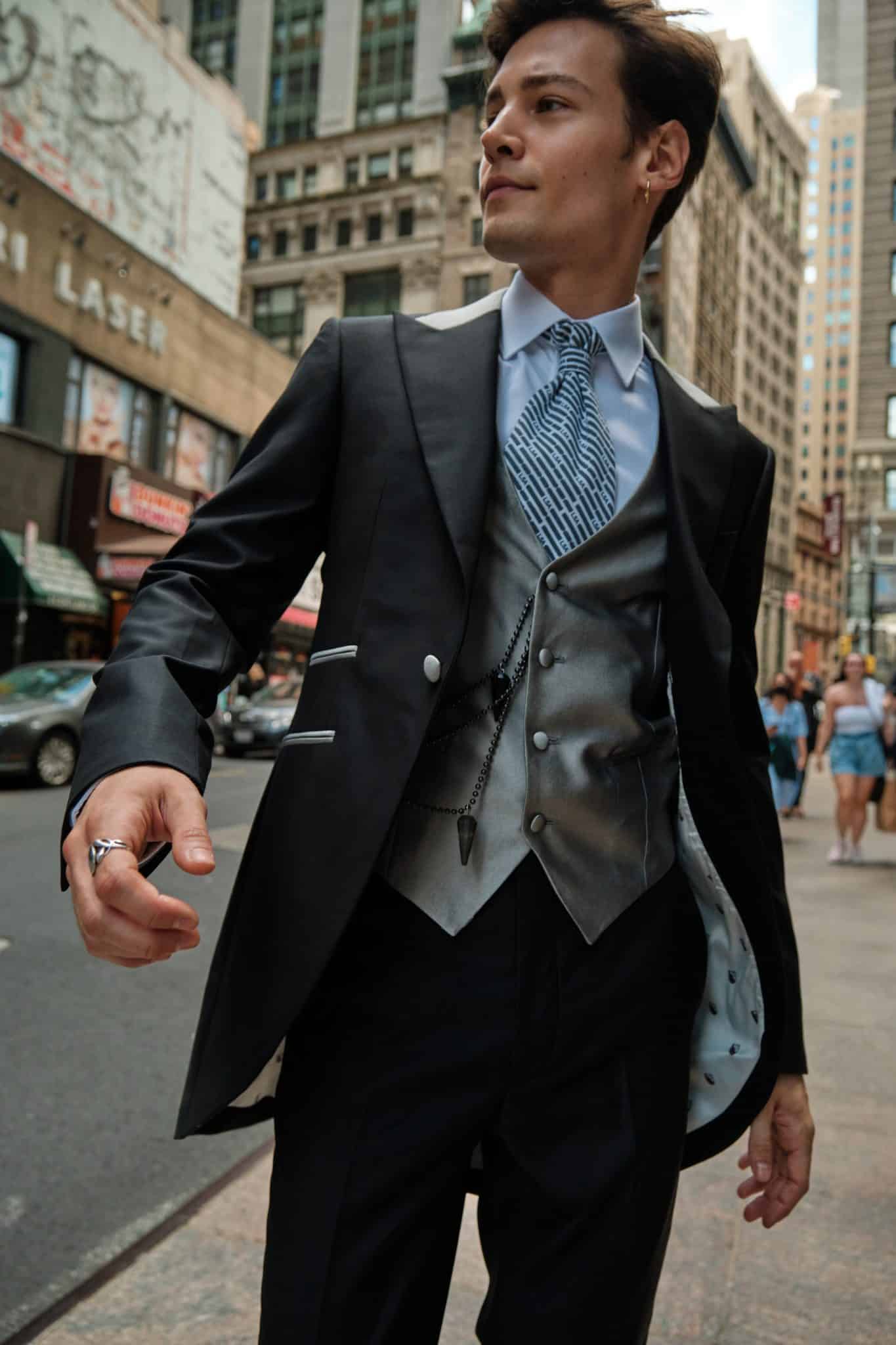Gentleman models Central Florida's Leonardo 5th Avenue modern black suit with wide lapels and vest
