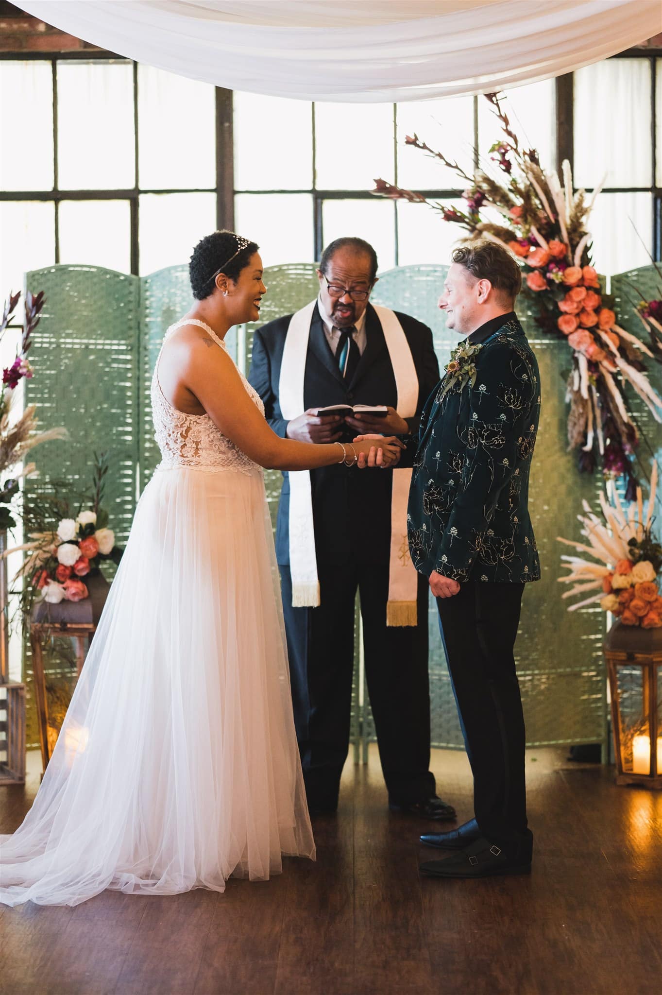 Melody and Steven exchanging vows at their unique and stylish wedding at Trellis 925.