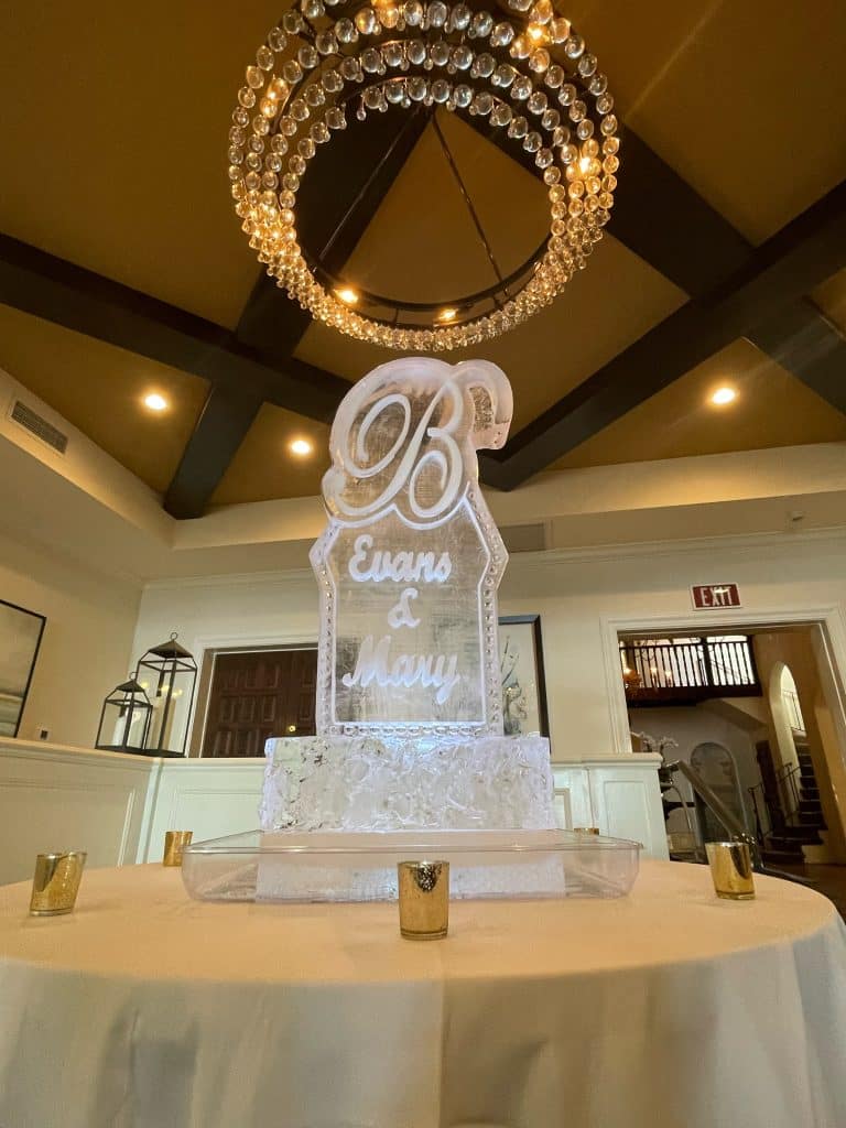 last name initial and names carved into ice sculpture by Ice Pro