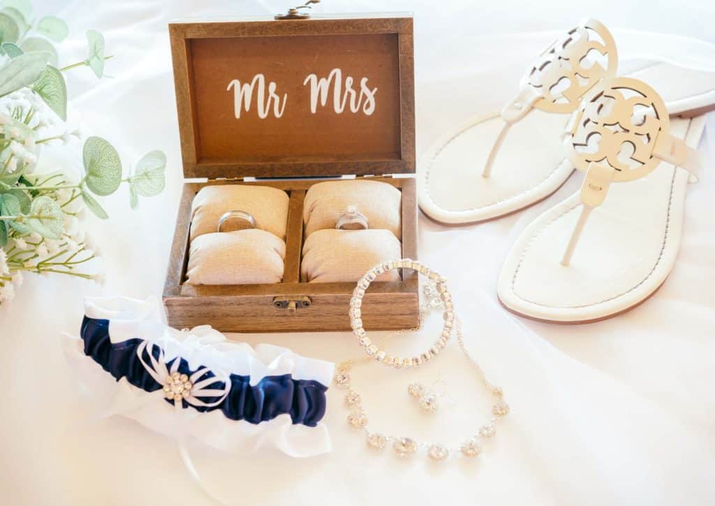 ring box, with jewelry accents and sandals photographed by Slone Photography, LLC