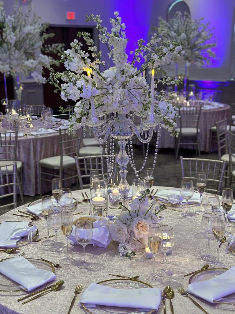lavender and cream reception table at wedding by Elite Celebrations