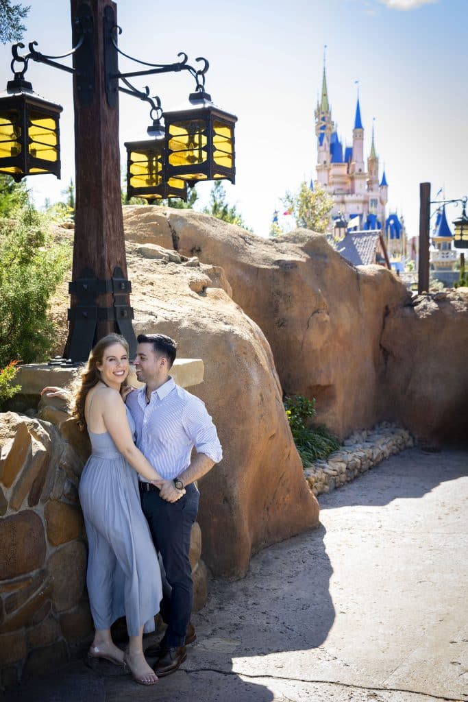 engaged couple beneath Hogwarts School of Witchcraft and Wizardry by Evan Hampton Photography