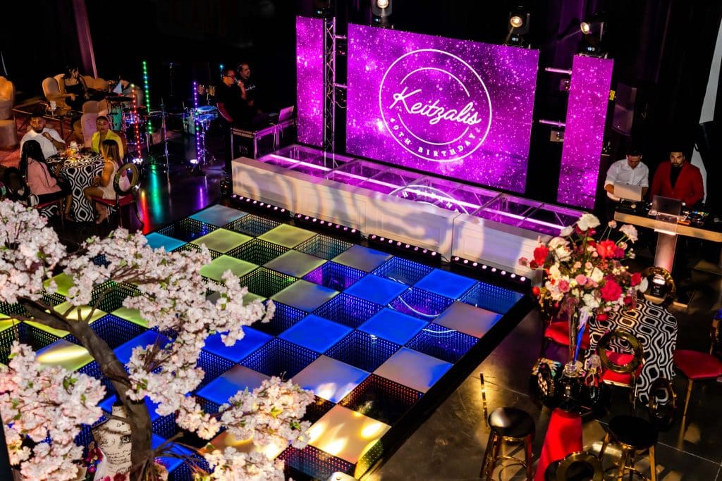 colorful dance floor and stage coordinated by Elite Celebrations