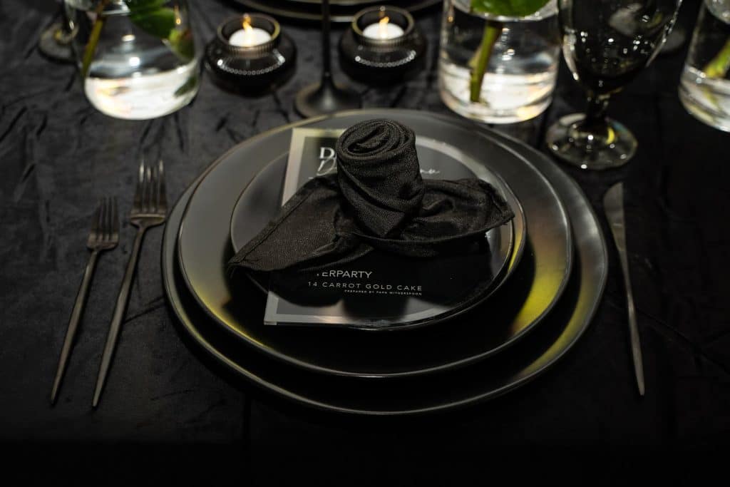 table setting in black from Echo Event Rentals