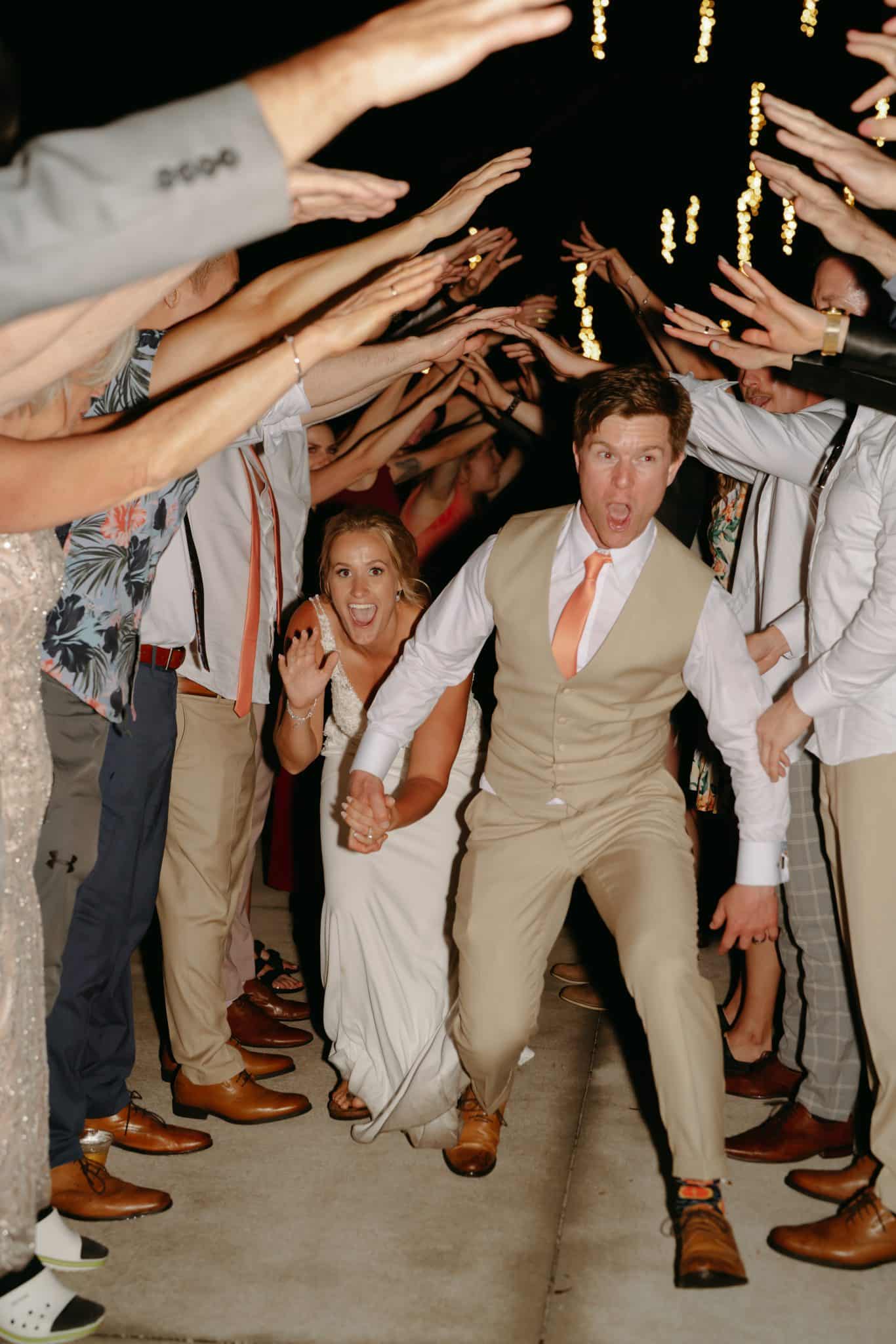 Sparkler exit at charming spring wedding at The Grand Ol' Barn in New Smyrna Florida