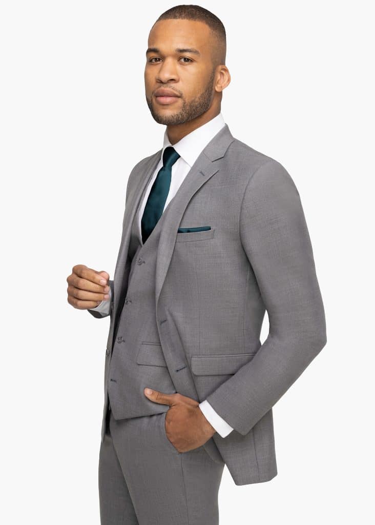 Man in grey suit with a blue tie, Generation Tux