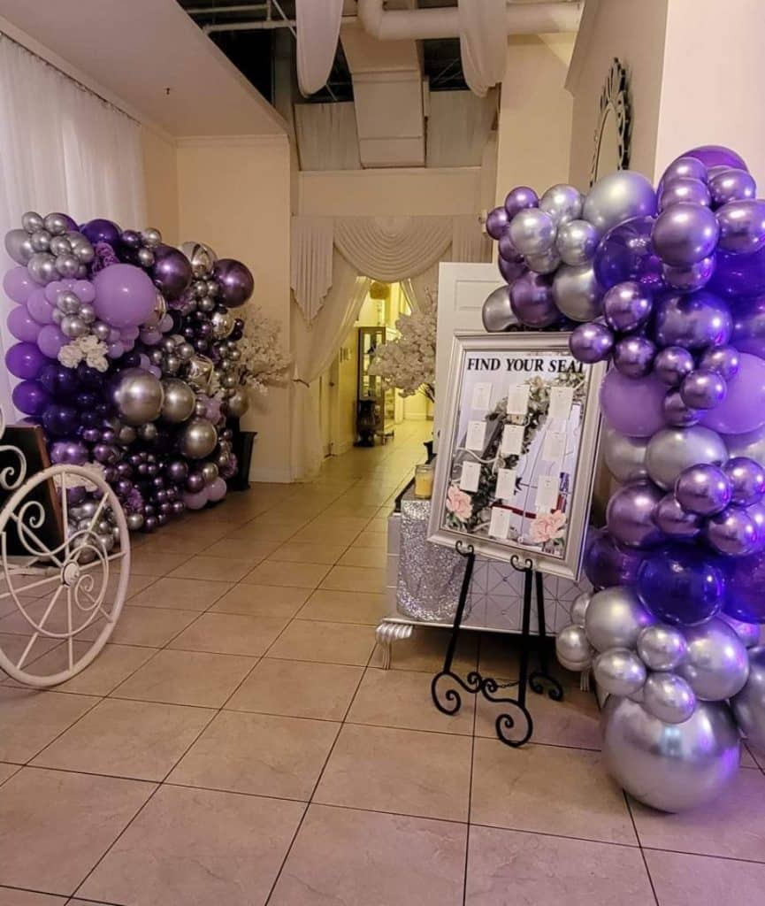 Balloon decorations in purple shades and silver at the entrance to the reception, Central FL