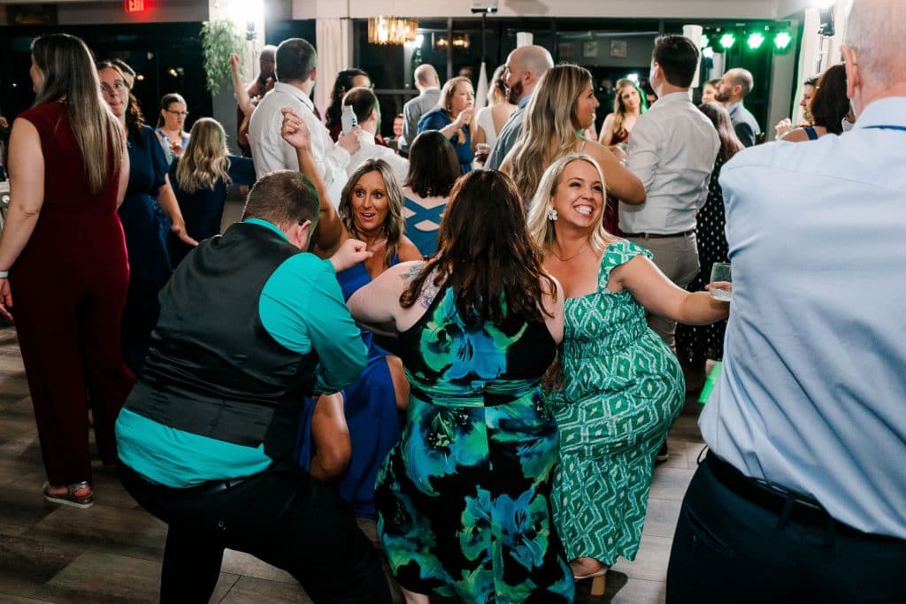 Dance party, guests laughing while dancing the night away, Kwik Entertainment