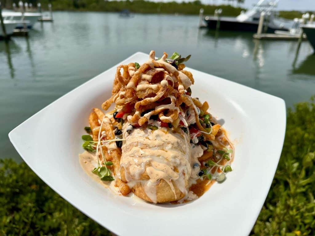 Beautifully plated entree on a white plate, Outriggers Tiki Bar & Grille, Central FL