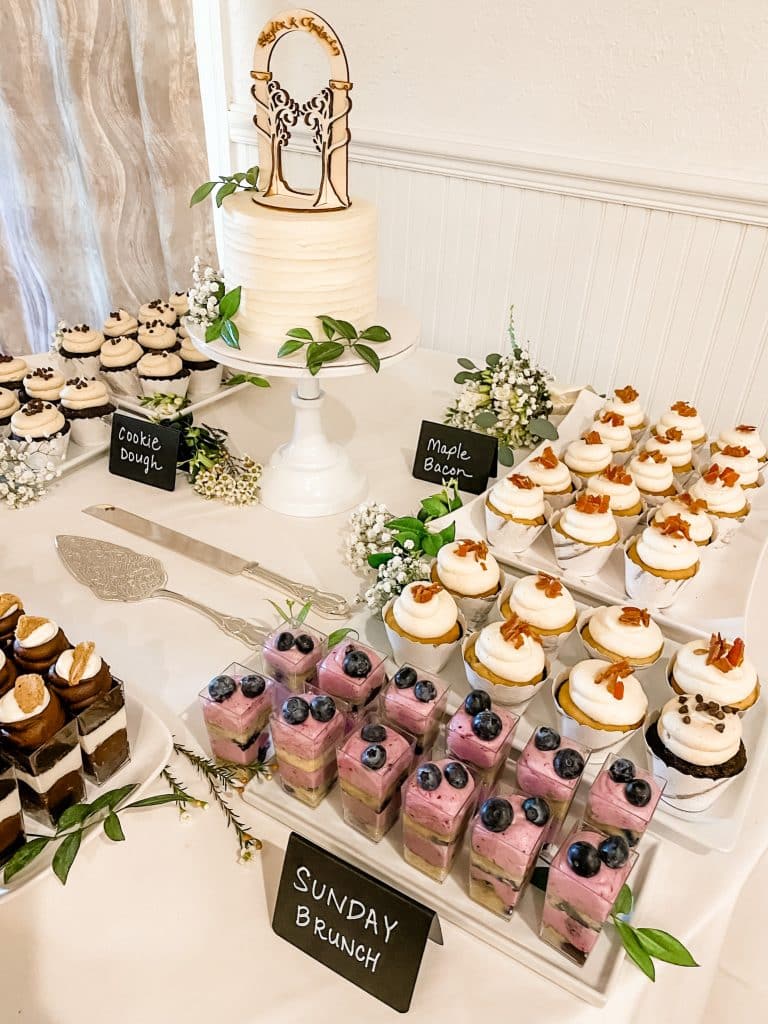 One tiered cake with a topper, accompanied Sunday brunch, maple bacon and cookie dough themed cupcakes and dessert shooters, Central, FL