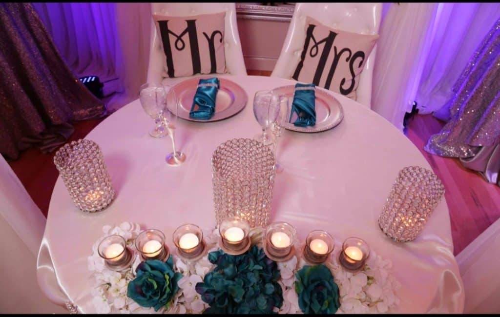 Head table rentals, votive candles, larger candles, Mr & Mrs pillows for chairs