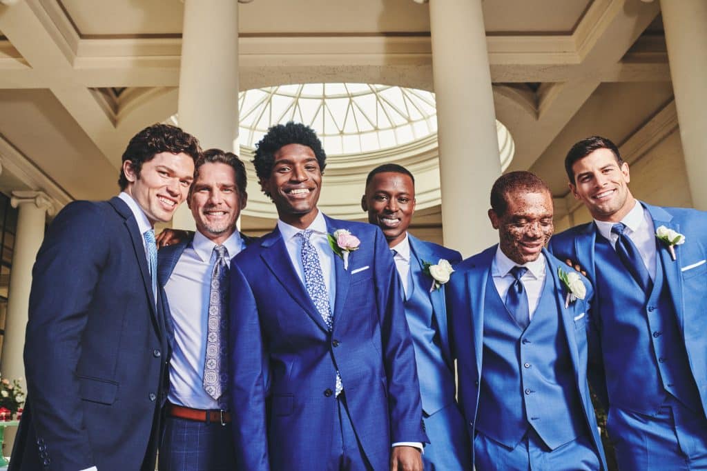Men standing with the groom, groomsmen in blue suits, other guests in different shades of blue suits, Central FL