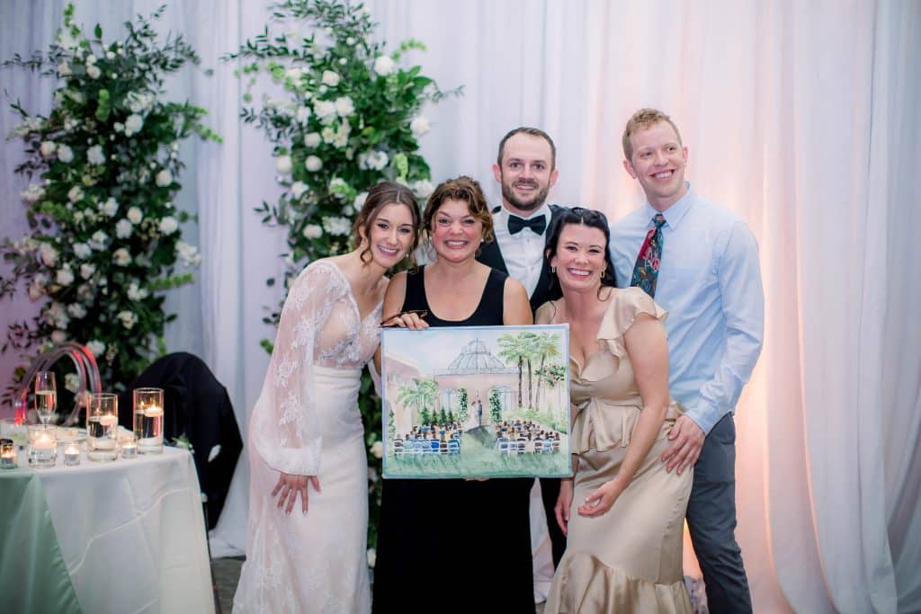 Artist with her painting and members of the wedding party, Caryn Dahm, Central FL