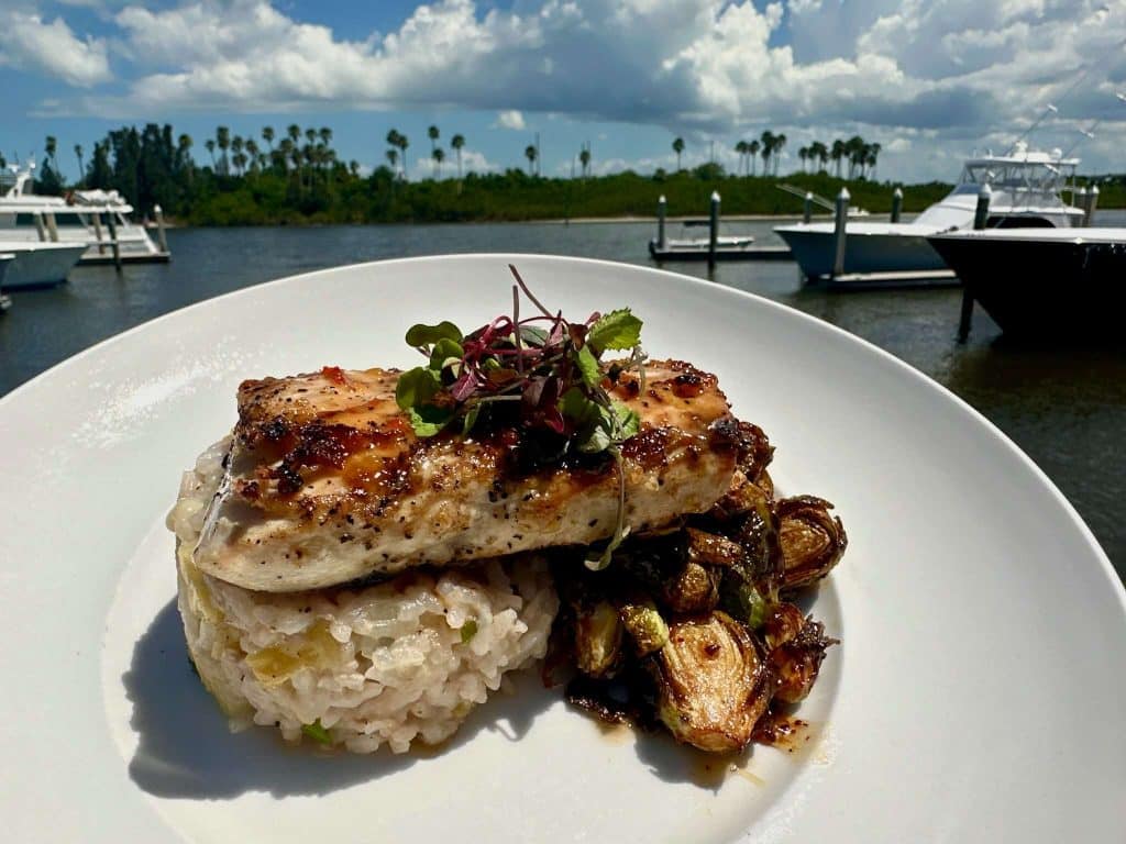 Chicken with risotto and accompanied by roasted brussel sprouts, Outriggers Tiki Bar & Grille, Central FL