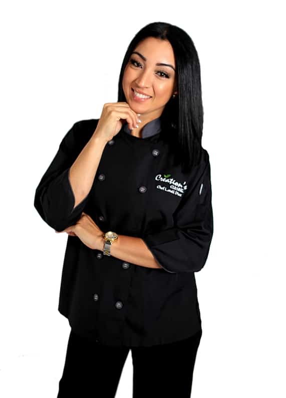 chef lorell diaz, wearing a black chef's coat, with the Creations Cuisine Inc logo on it, Central FL