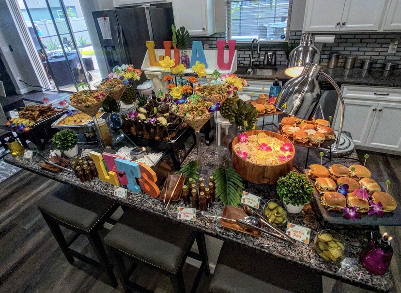 Luau themed party, buffet set up with sandwiches, salads and condiments, Central FL