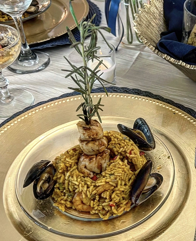 seafood with rice, tower of scallops in the center, mussels around the plate, Queen Chef Catering, Central FL