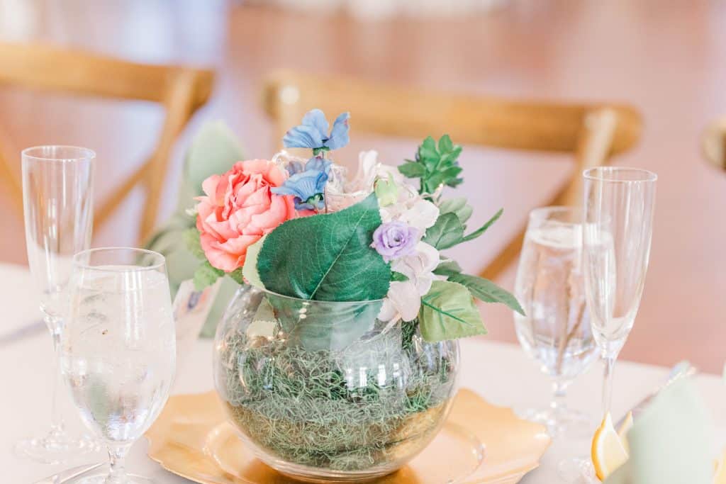 small glass bowl, used as a vase for flower on the tables at a reception, Central FL