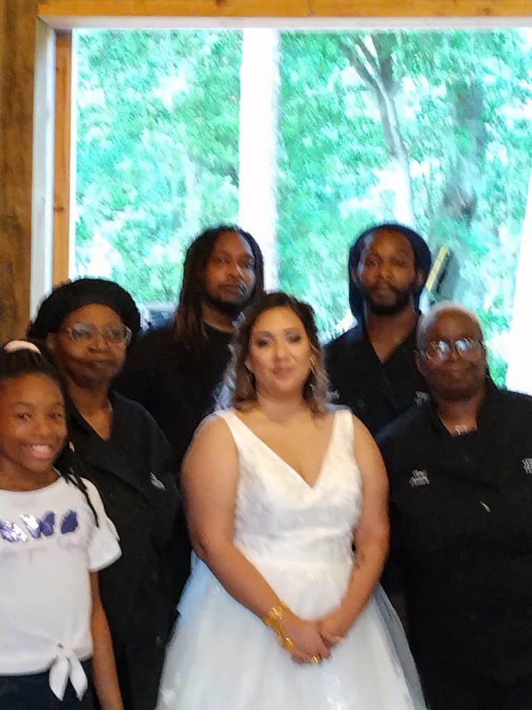 Chef Teri & Co Catering Services staff along with the bride, Central FL