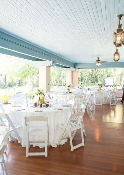 Tables with white tablecloths and white chairs, outdoors, Sydonie Mansion, Orlando, FL