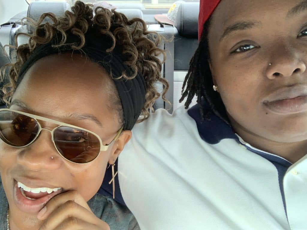 couple takes selfie together in car