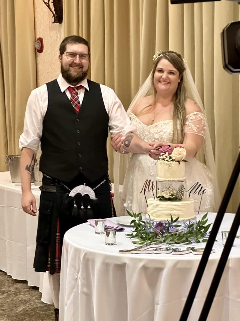 Bride and Groom with their wedding cake, Orlando, FL