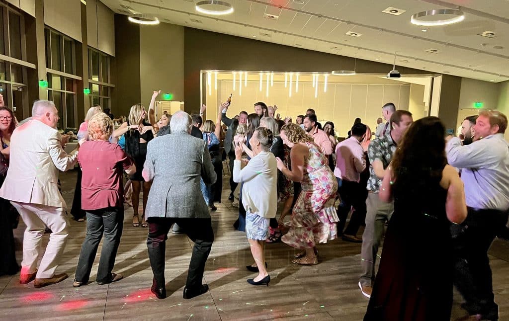 Lots of wedding guests dancing to a classic wedding song, Diamond Dj Events, Orlando, FL