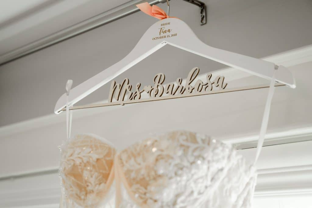close up of custom hanger for bride's wedding dress