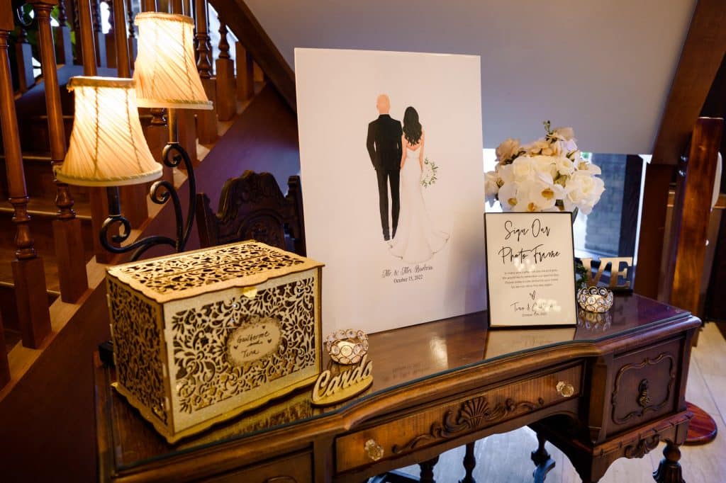 welcome card and guestbook table at wedding day