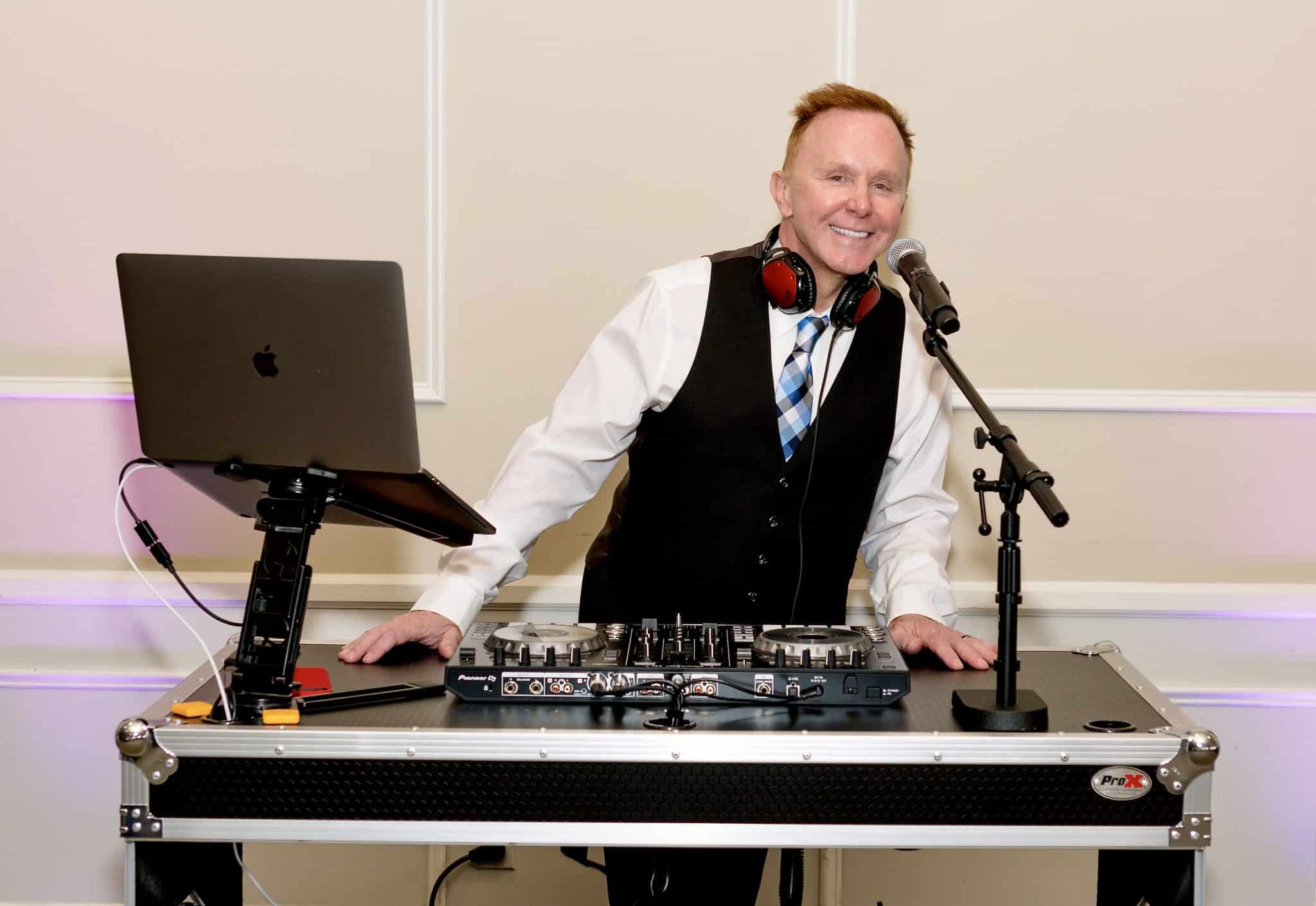 DJ Allen smiling for the camera as he provides music and entertainment for his guests, Diamond Dj Events, Orlando, FL