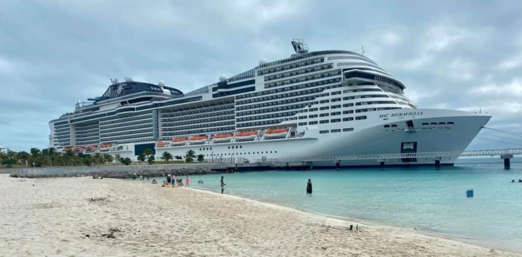 large cruise ship, docked at the shore, overcast day, Cruise Island Travel, Orlando, FL