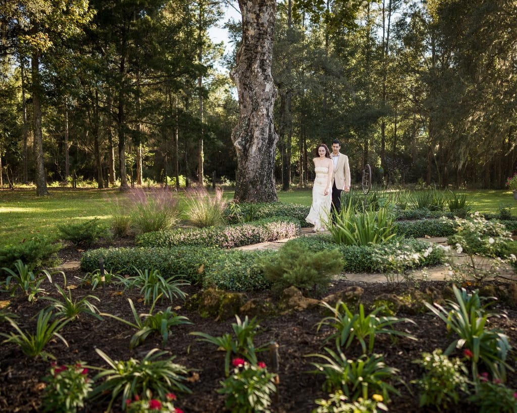 wedding couple standing in the garden, pegasus manor, orlando, FL