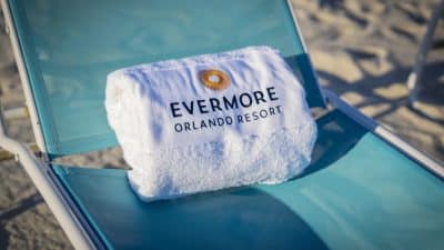 beach chair with an Evermore Orlando Resort towel folded on it, Orlando, FL