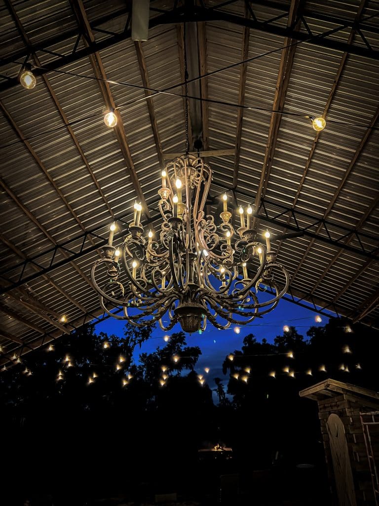 large golden chandelier, vaulted ceiling, Grass Campers Event Venue, Orlando, FL