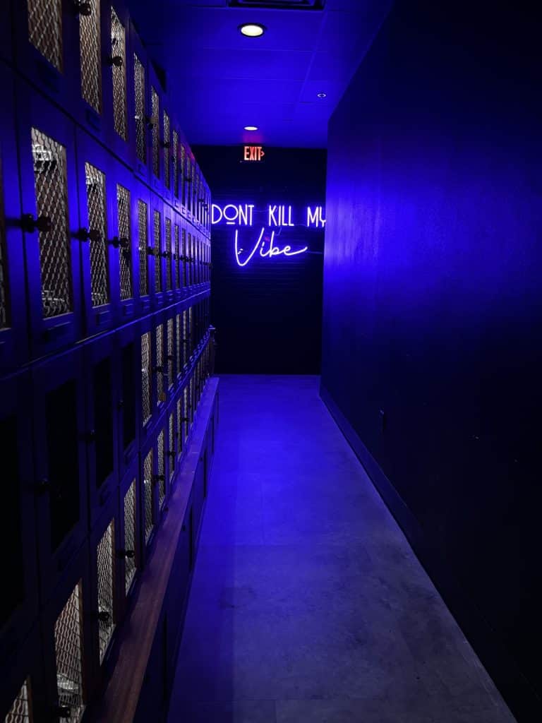 wine cellar hallway, Don't Kill My Vibe neon sign, Jazz Tastings, Orlando, FL