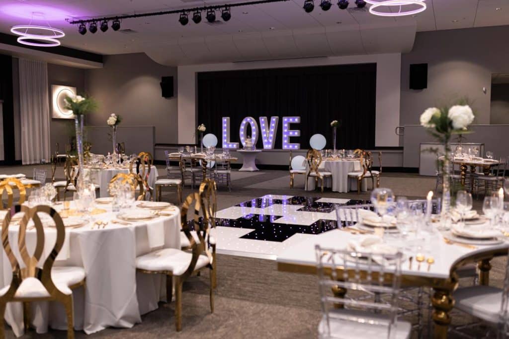 reception set up, LOVE letters lit up, black and white checkered dance floor, The Center at Deltona, Orlando, FL