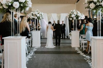 wedding ceremony, indoors, bride and groom at the altar, Orlando, FL