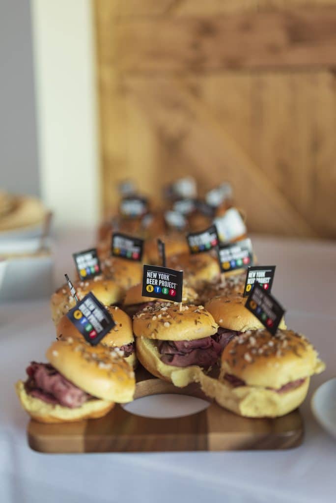 burger sliders displayed on a wooden display board, with NYBP party picks on top, New York Beer Project, Orlando, FL