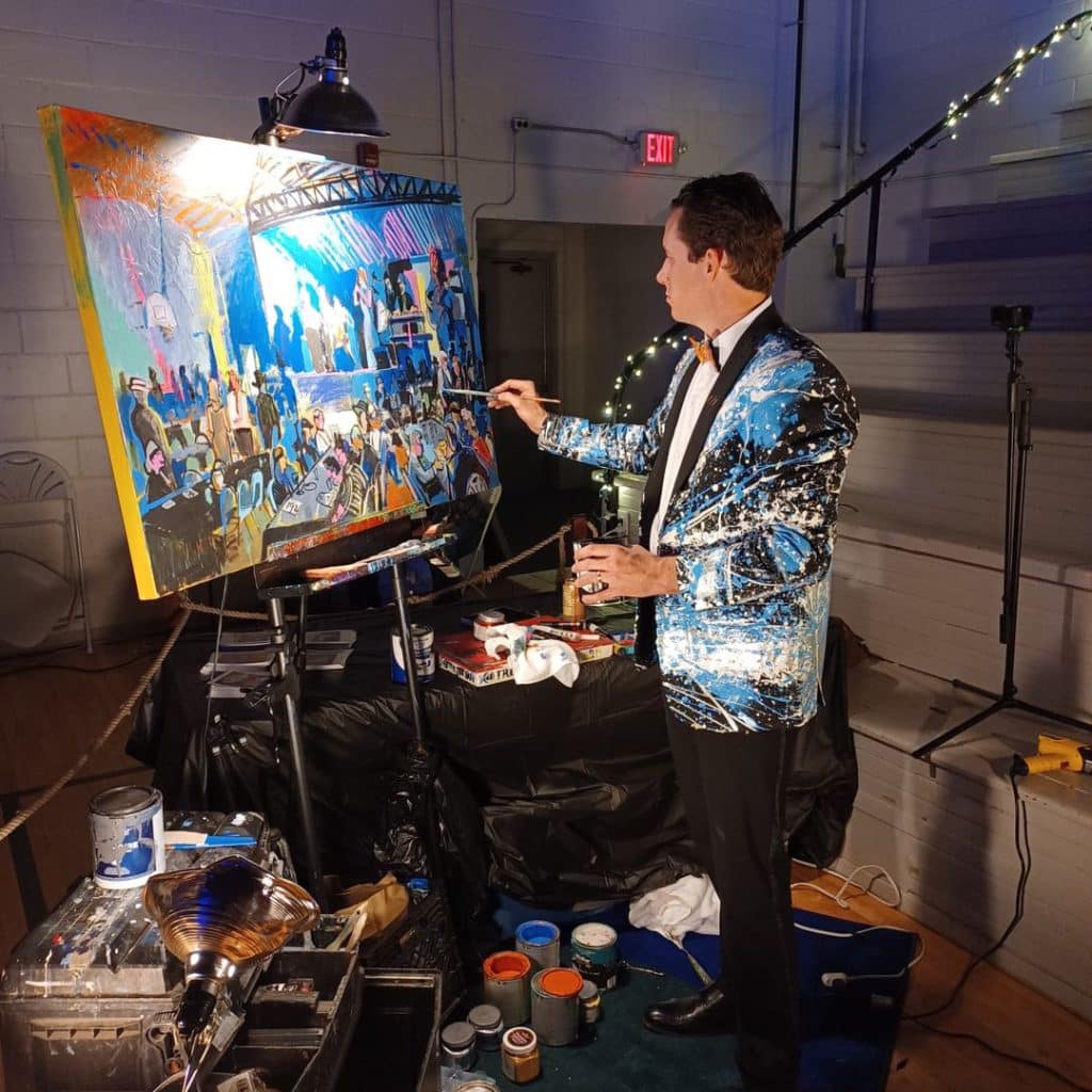 Tre Bryan painting during a wedding reception, LIVE ART PAINTING, Orlando, FL