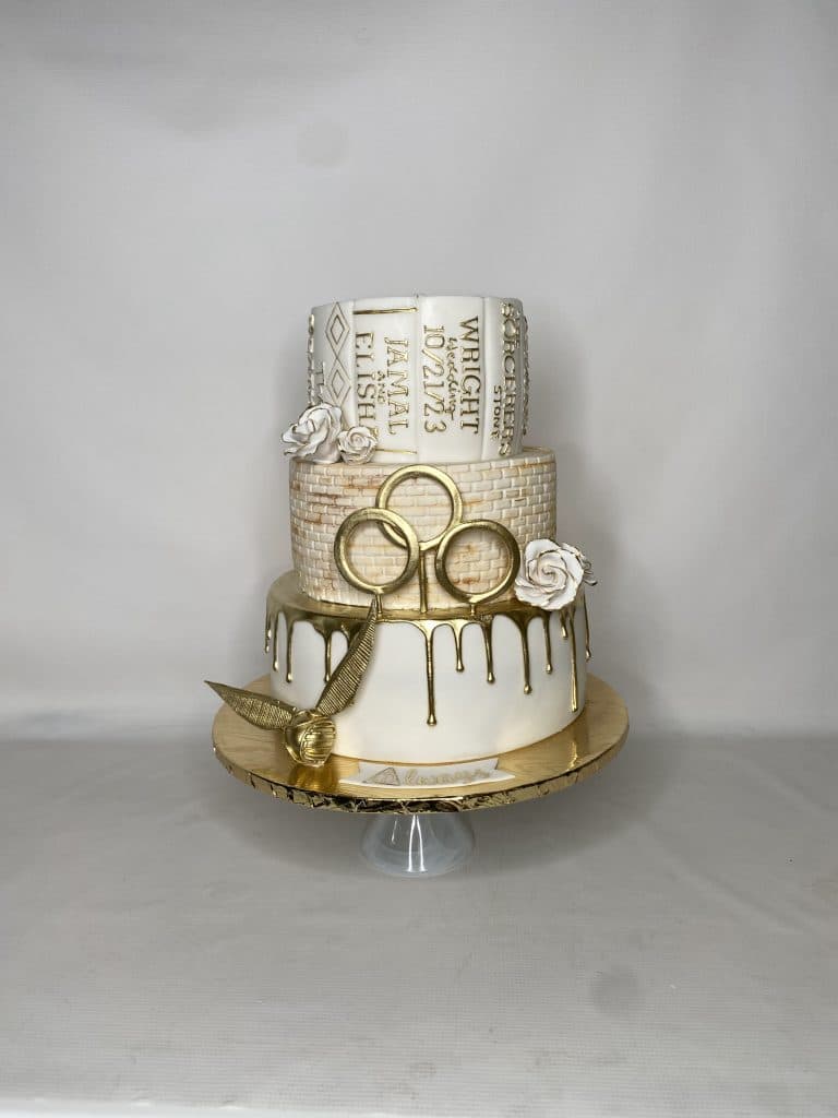three layer cake, white and gold embellishments, gold overlay, gold rings, Orlando, FL