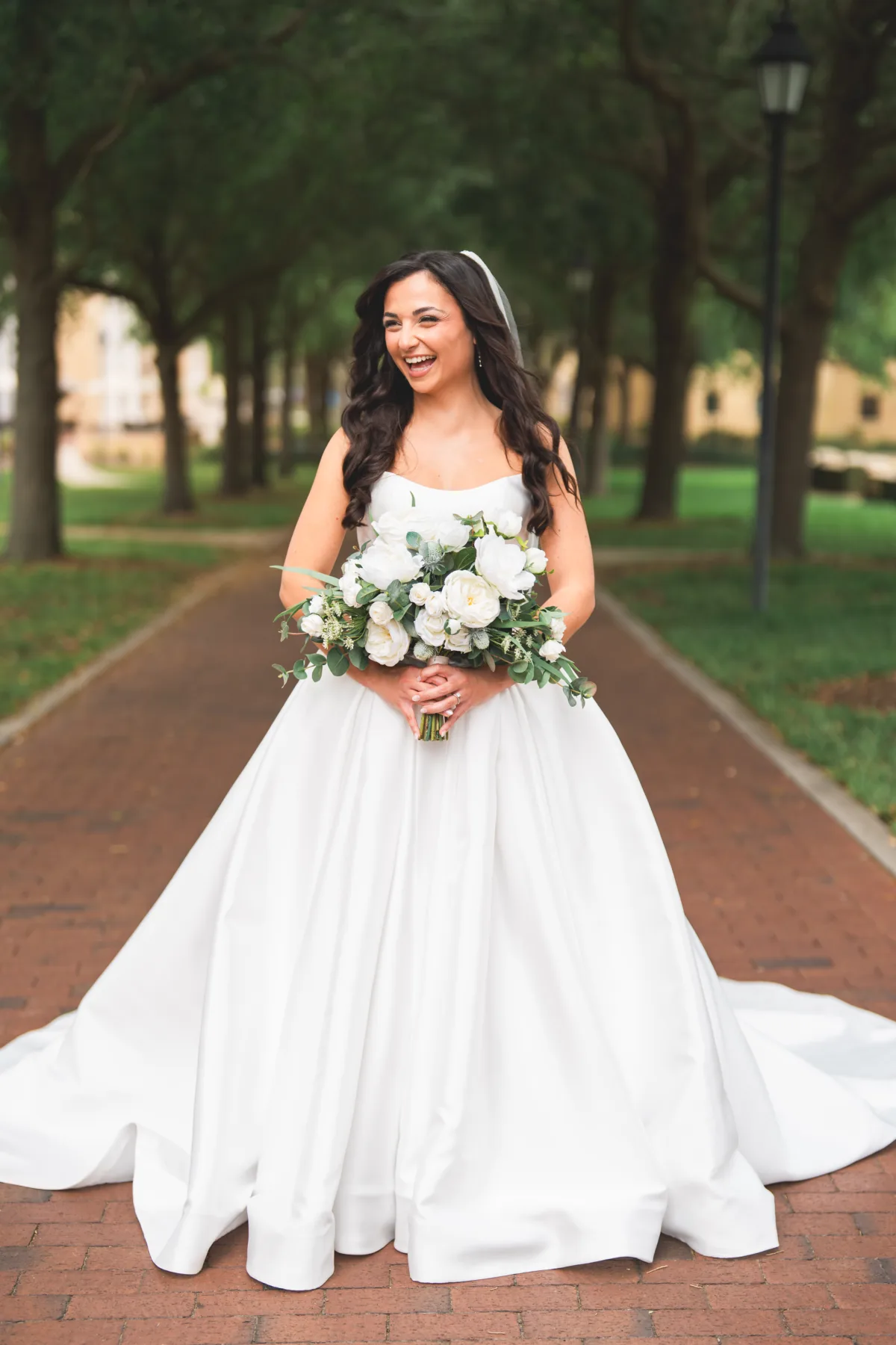Luxury bride at Rollins College with white florals
