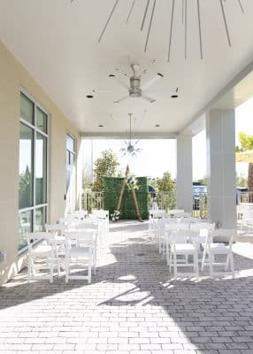 outdoor patio area, white porch furniture, Hyatt House Orlando Airport