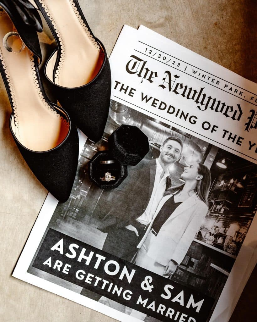 flatlay, wedding shoes, rings, newspaper article, Orlando, FL